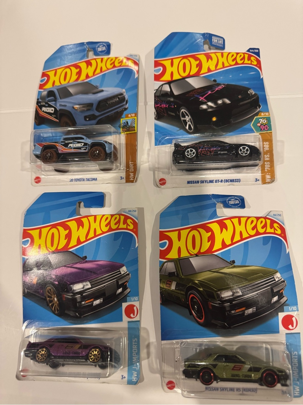 Hot Wheels Assorted Die-Cast Car Pack — Blue, Black, Purple, Green
